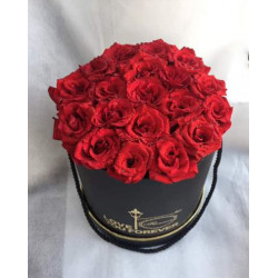 Round box of red roses